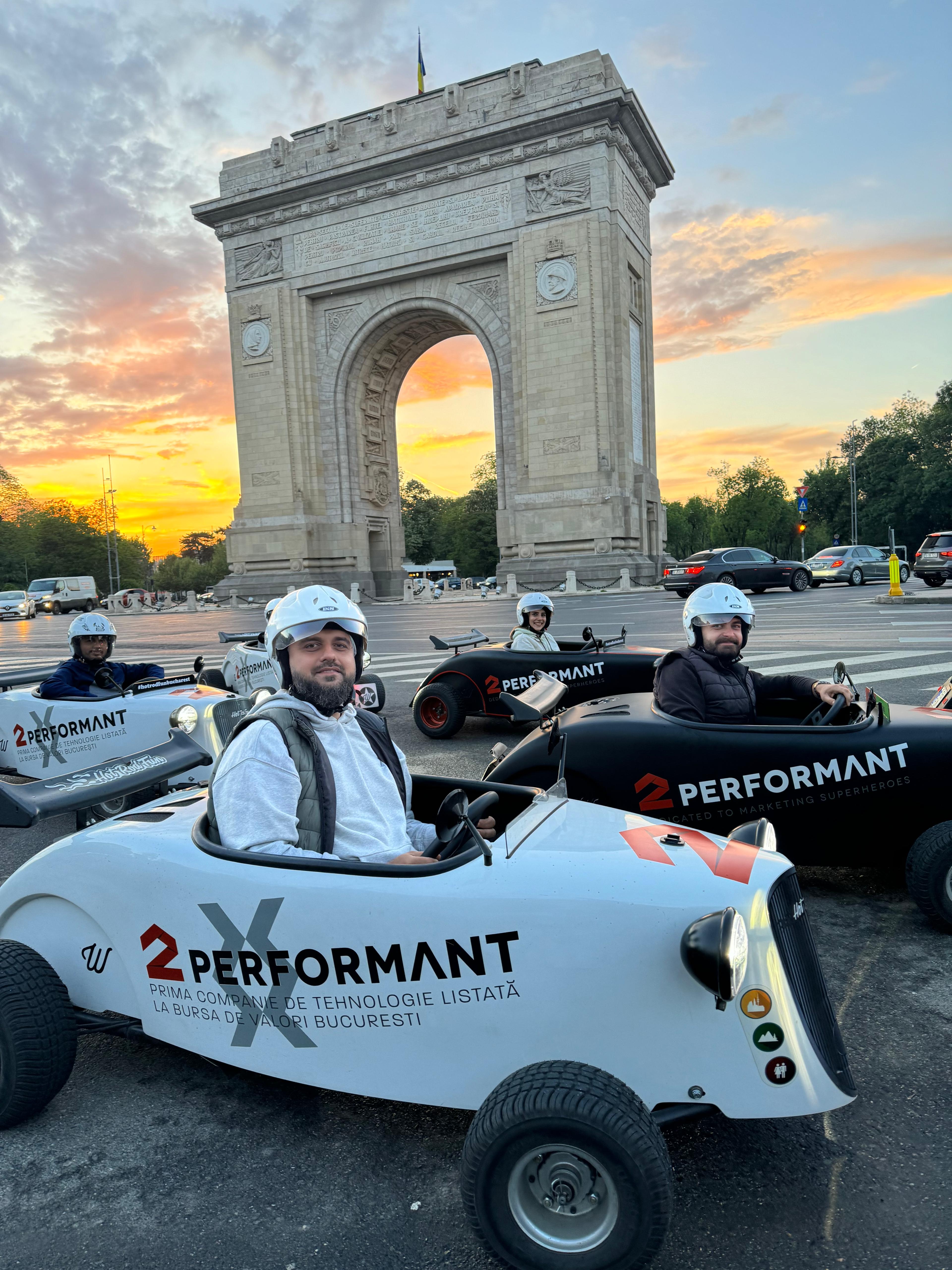 Hot Rod convoy at sunset by Arc de Triomphe