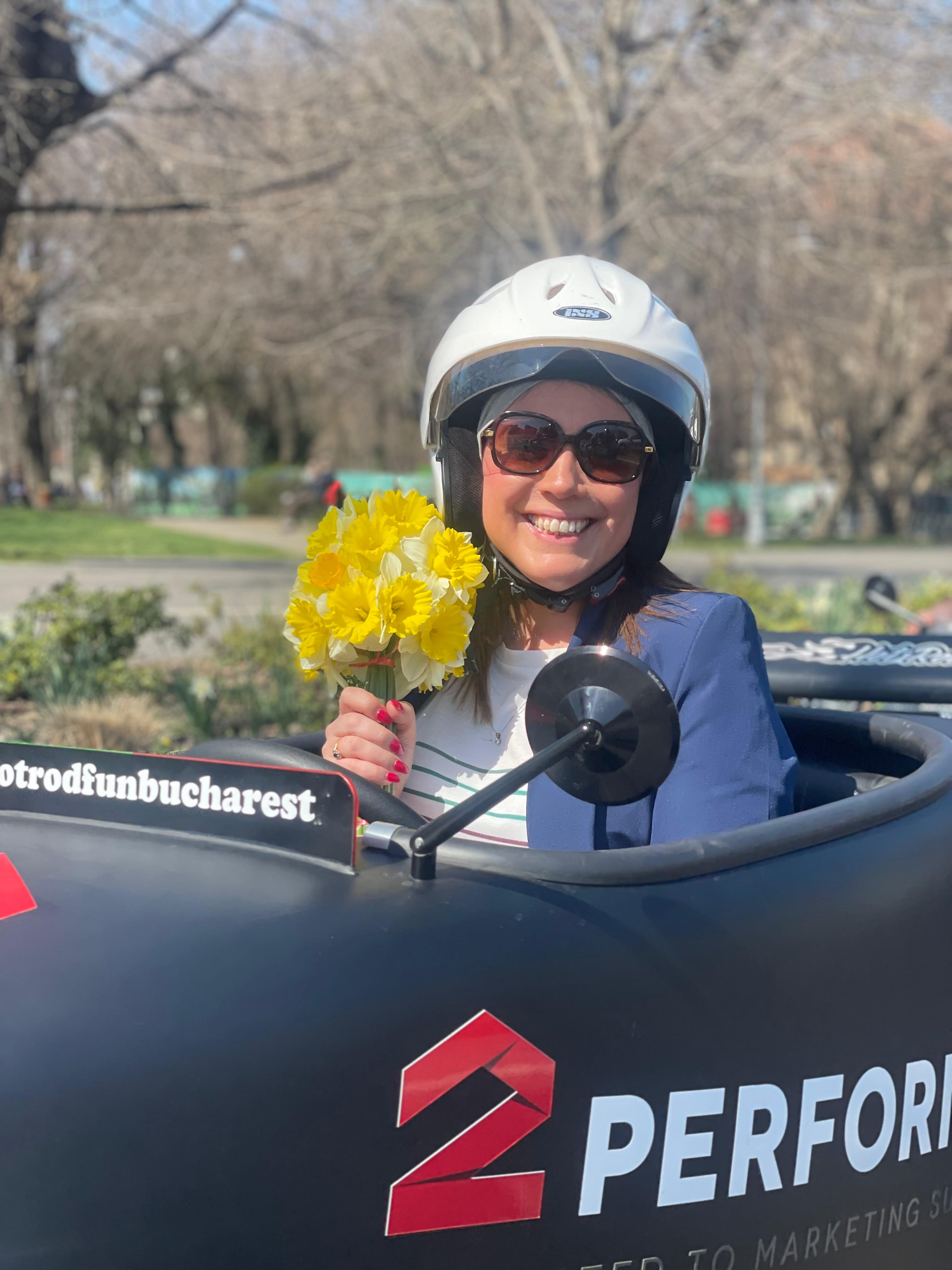 Happy driver with flowers in Hot Rod